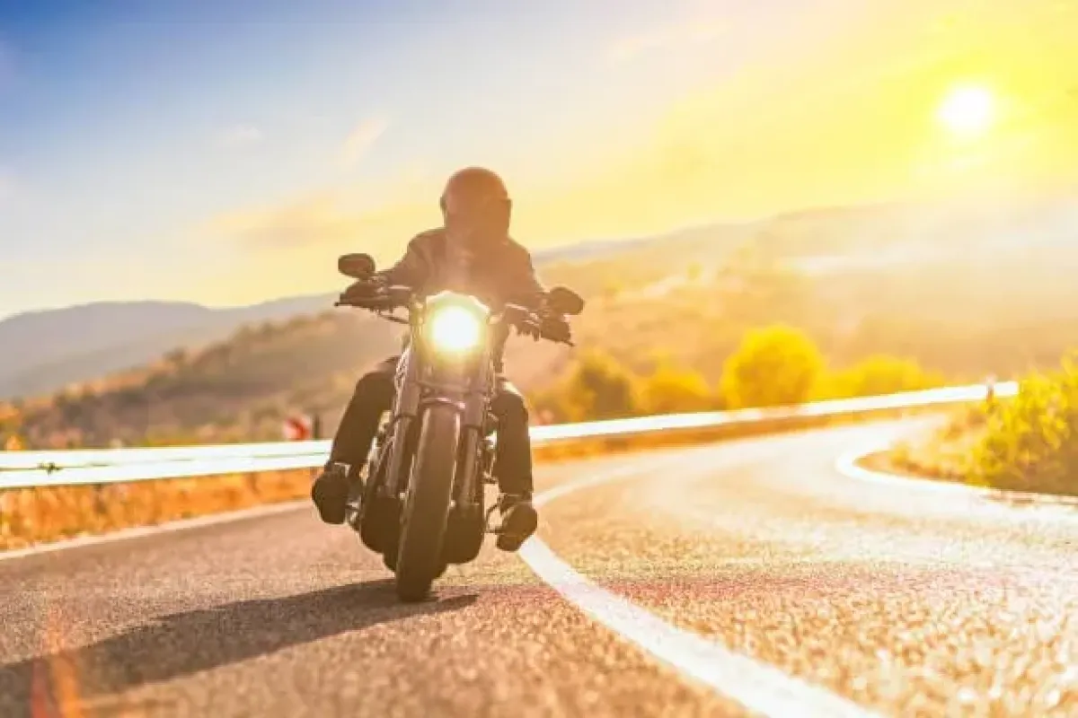 What is the best time of year to go on a motorcycle tour in Spain?